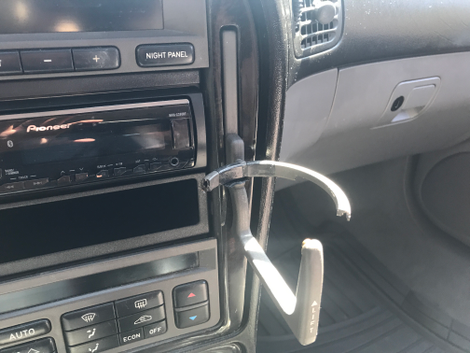 What is it about European cars and shitty cupholders?